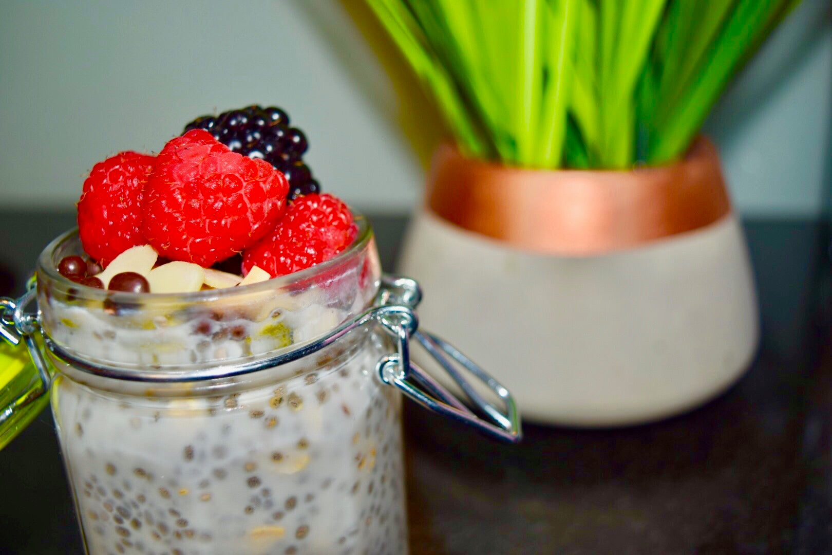 Chia seed pudding with lots of seeds, sliced almonds and fresh fruit super easy to make and a great breakfast or snack idea | NatCan Integrative Medical & Wellness Centre Vaughan ON